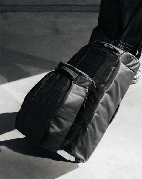 Campaign item: Hugger Roller Bag Check-in 60L / Blackout